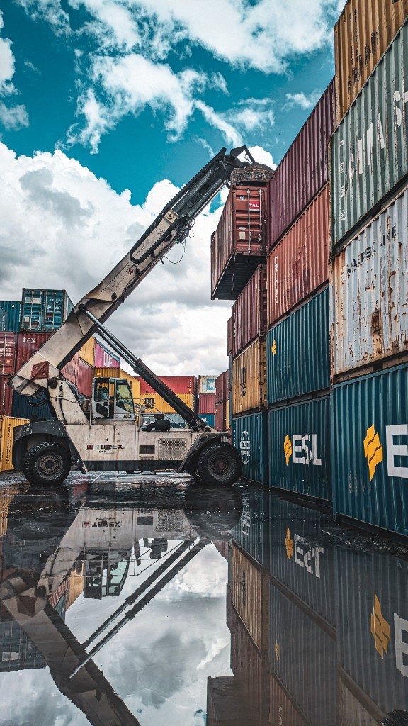 Reach stacker loading shipping containers for export